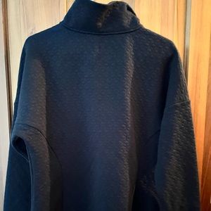 Fig quarter zip sweat shirt. Texture is slightly quilted. Black.